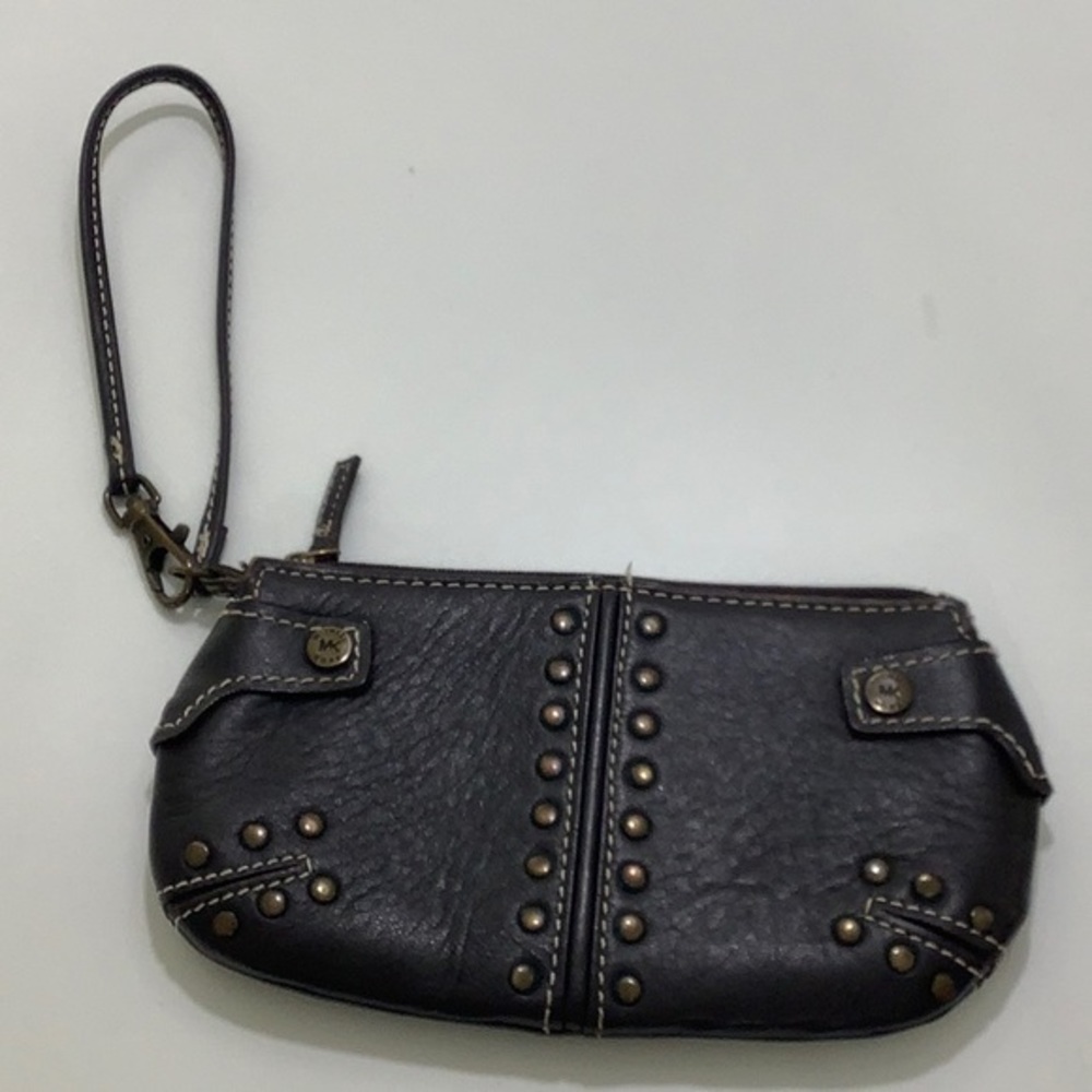 Michael Michael Kors brass studs leather wristlet size 7.5X4 EUC